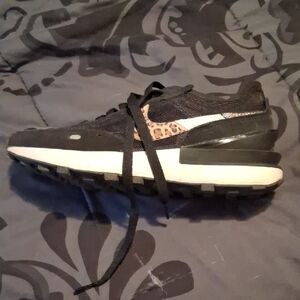 Nikes Black and White Tennis Shoes, with Leopard Accent. Only Worn Once Or Twice